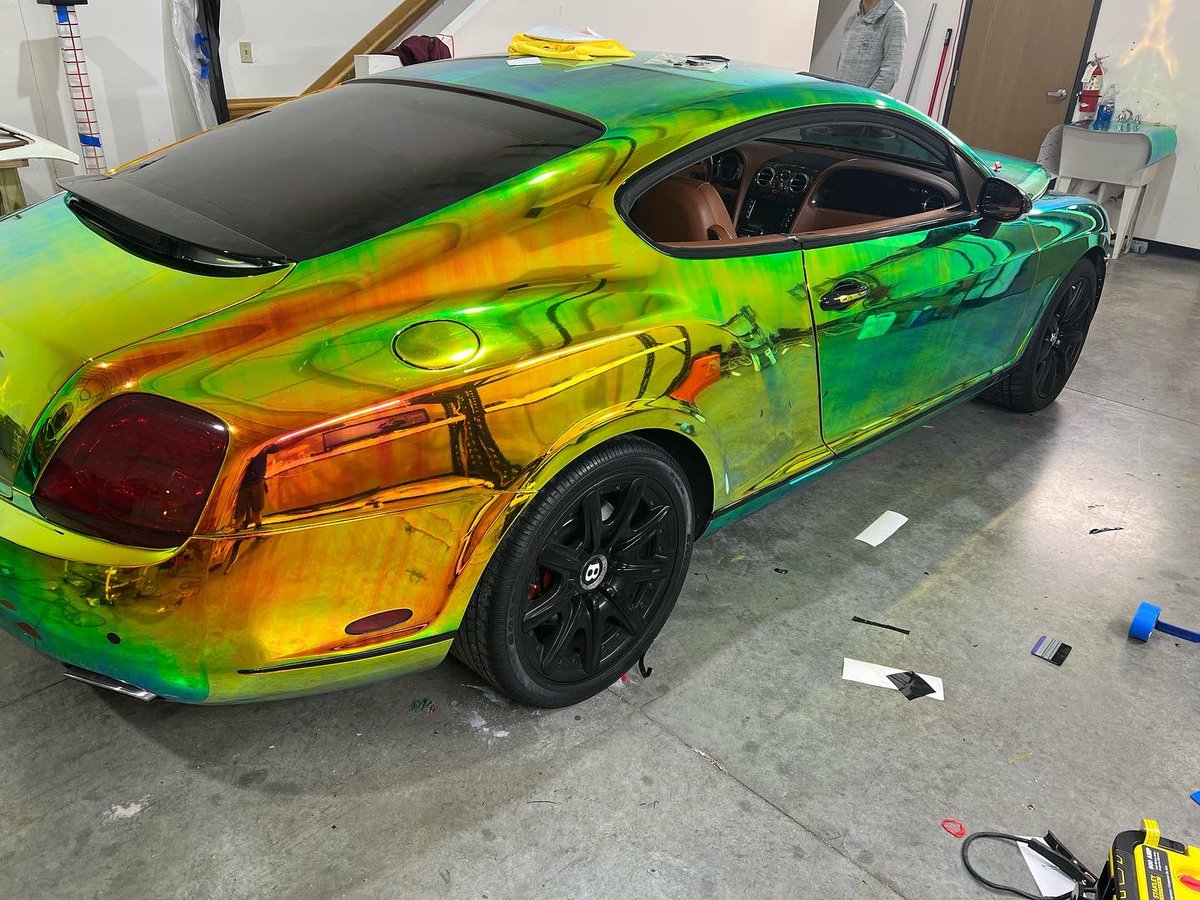TierOneWraps's tweet photo. White Bentley GT turned TechWrap Neo Chrome Ammolite Gem! 

Complete Color Change with Chrome Delete around the window trim and mirrors. 

Reach out with any questions on possible colors or options for wraps! 

#TechWrap #ColorChange #VinylWrap #BentleyGT #PaintIsDead #TierOne https://t.co/p228WgyjAx