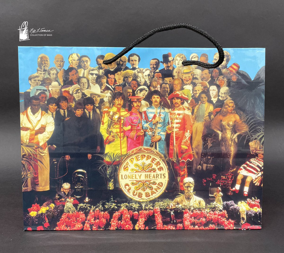 75/365: Today's bag features the The Beatles' Sgt. Pepper's Lonely Hearts Club Band. The album cover was designed by pop artists Peter Blake & Jann Haworth; it features 57 photos & 9 waxworks - including the bands' own figures from Madame Tussauds.