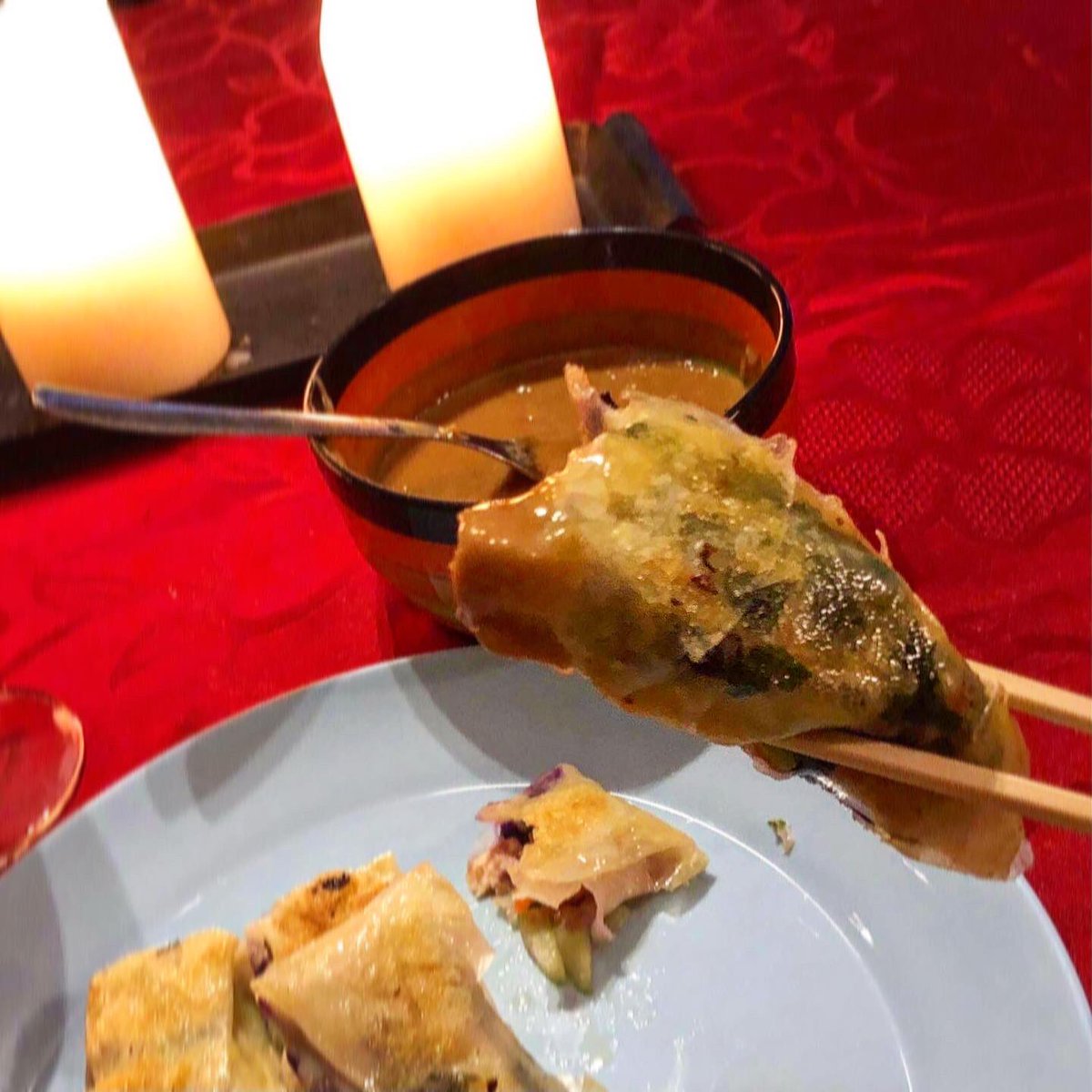 SweMetalChef's tweet image. First time making spring rolls. Test subject gave two thumbs up! \m/ #springrolls #peanutsauce #chicken #vegetables