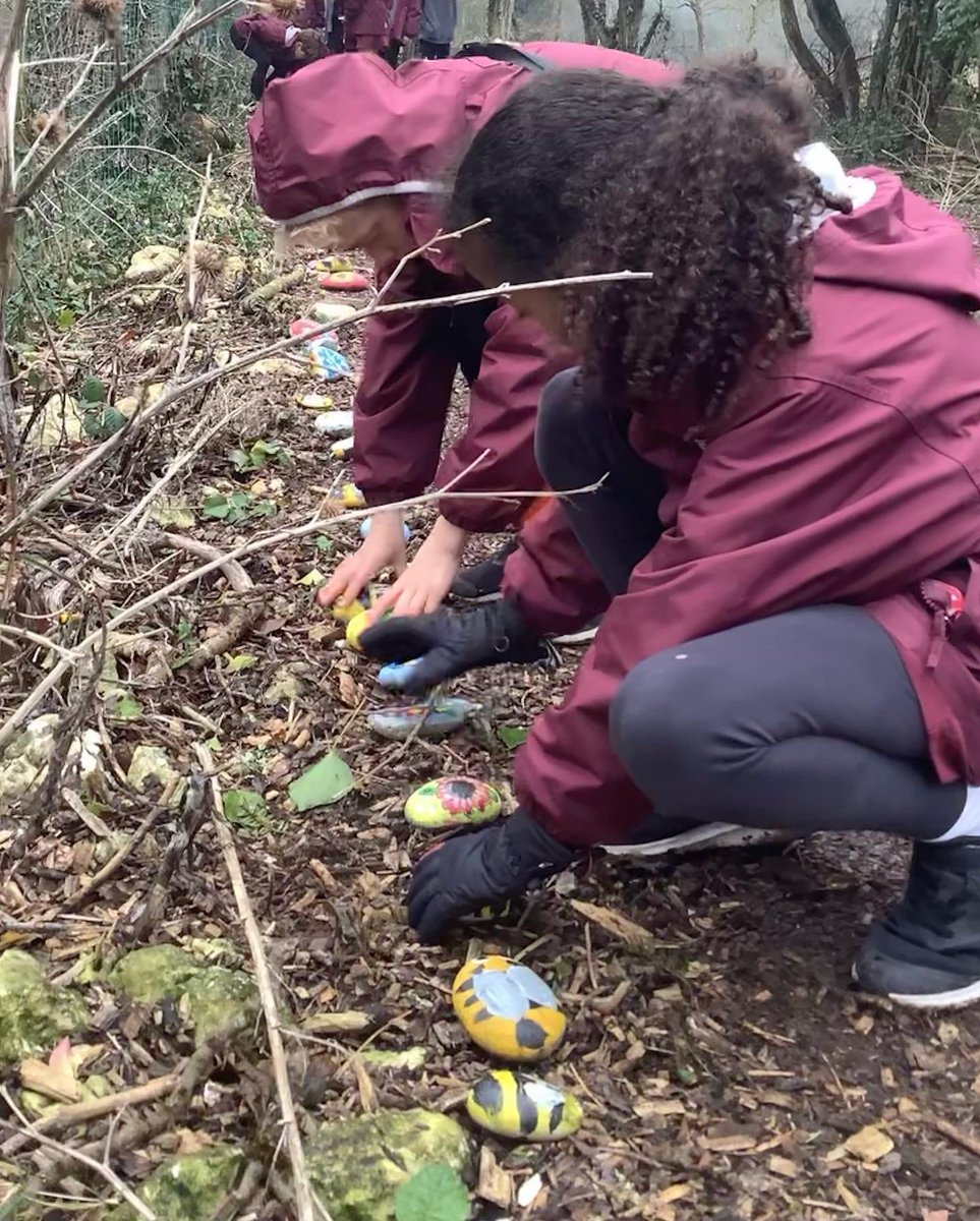 ArtCaterham's tweet photo. The first collection of the Prep and Pre-Prep painted Giving Day stones were placed in Old Park Wood this afternoon. They will bring a smile to the faces of the many children and members of the Caterham community that walk by #CreateABuzz #caterhamprep #bekind #behappy #art https://t.co/HbVkXbbELD