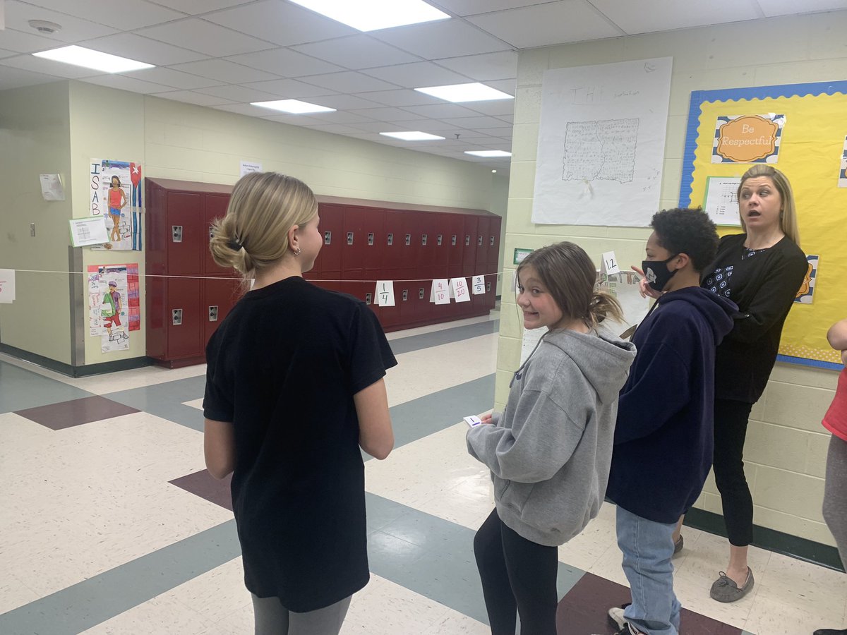 MrsFarrow3's tweet photo. Limbo or ordering rational numbers? A little of both! @AhernMiddle #learnwithahern https://t.co/Ea2jQpoDnK