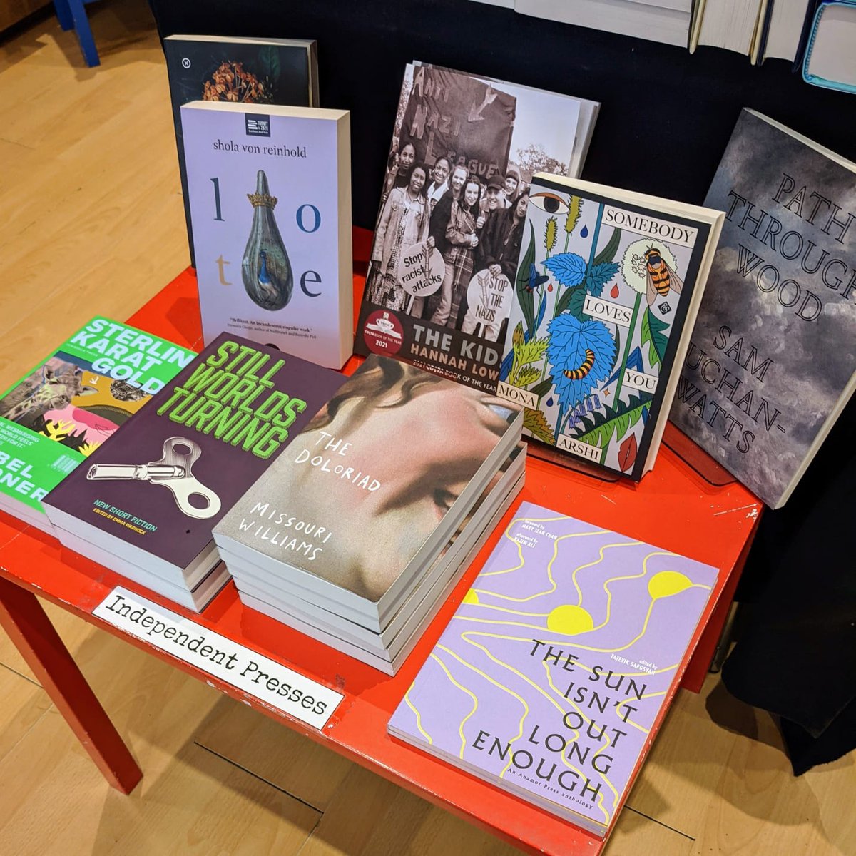 BrickLaneBooks's tweet photo. Our indie press table is looking great today, if we do say so ourselves 🔥 

Featuring @anamotpress, @andothertweets, @BloodaxeBooks, @DeadInkBooks, @JacarandaBooks, @NoAlibisPress, @PressPeninsula, @prototypepubs, and @TrampPress! https://t.co/OdEY208226