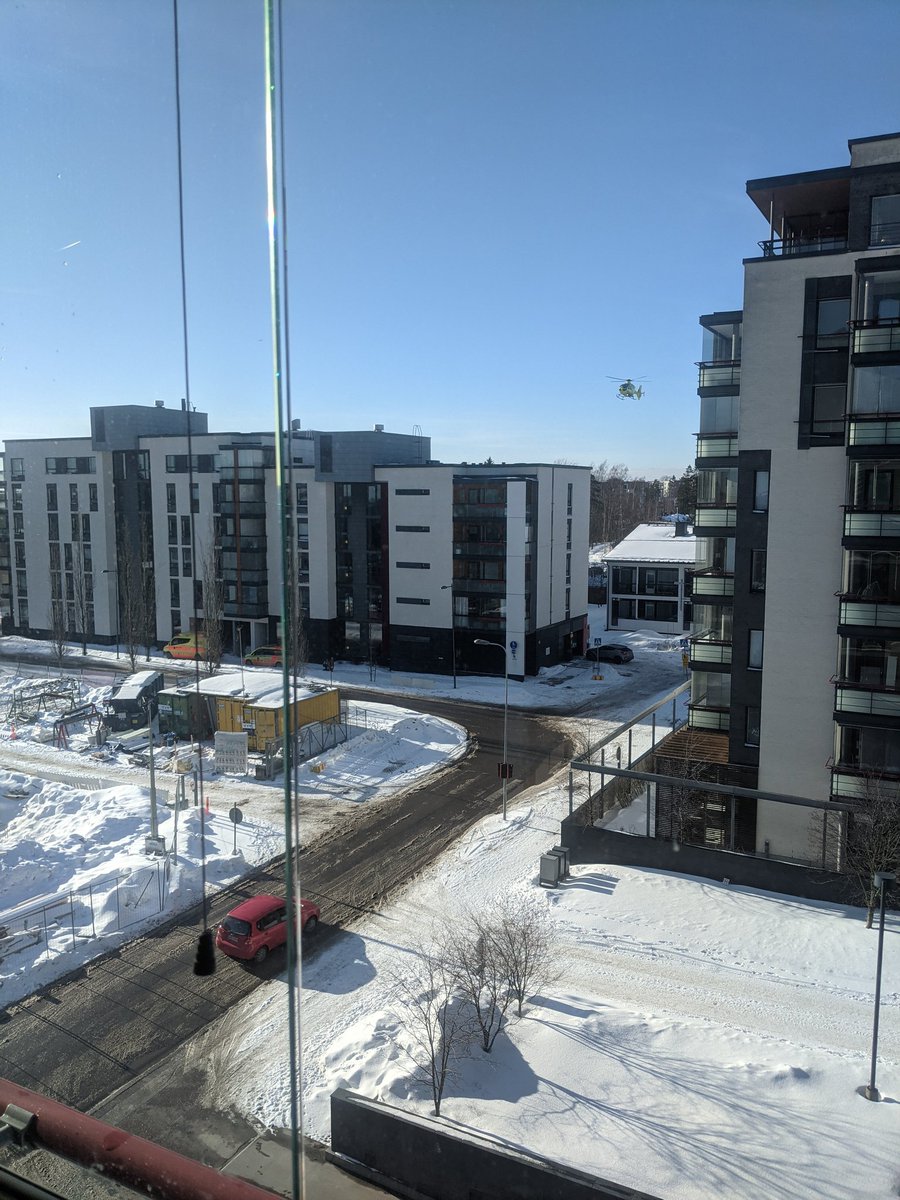 ducksref's tweet photo. Wish everybody would be alright! Pilot landing the heli on a tissue-sized yard with trees, playground - amazing skills. Ambulance, firefighters, all on board. #finland #ambulance https://t.co/q5VLUys6XZ