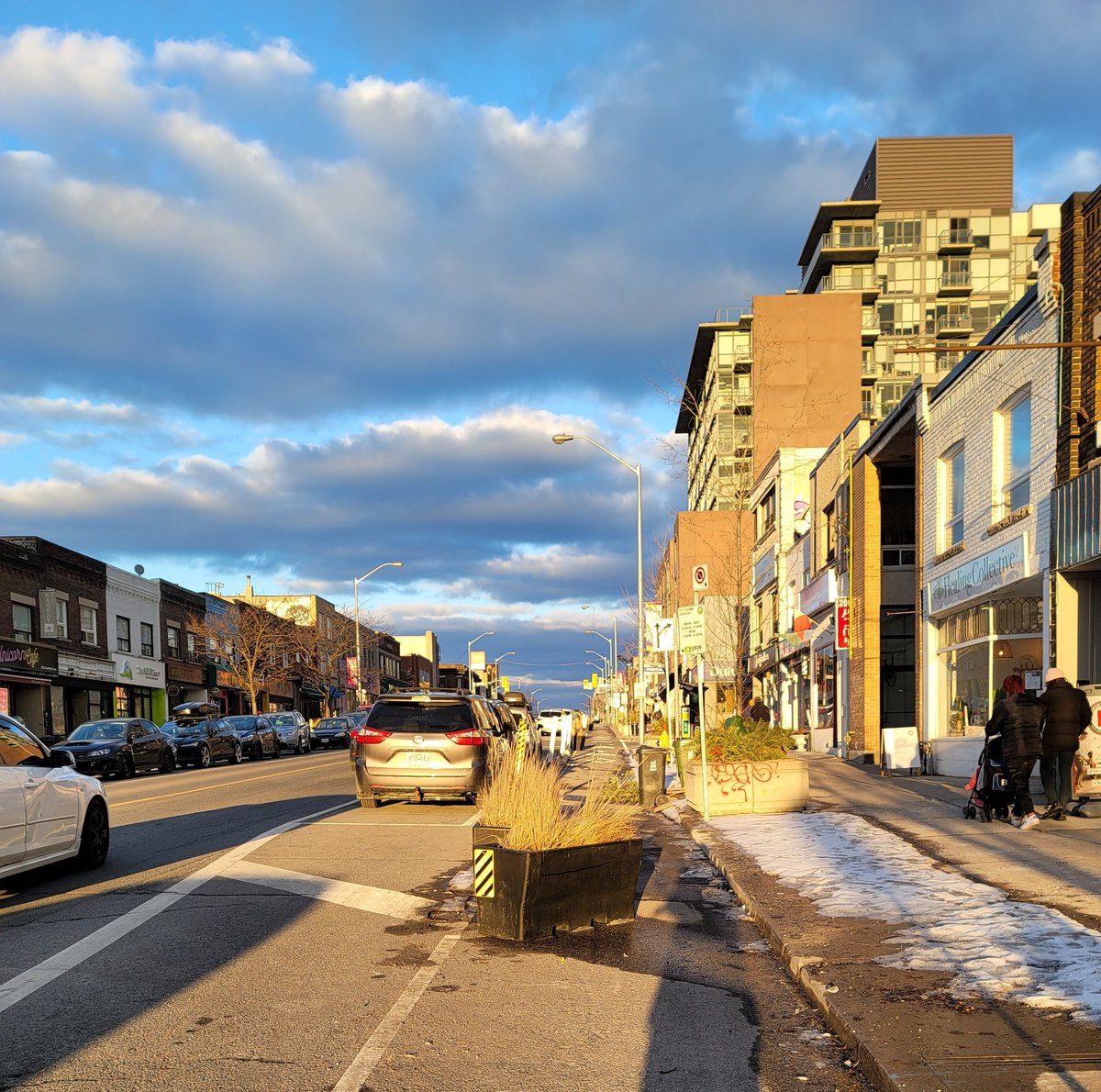 ErnieandCheeto's tweet photo. @311Toronto not sure how its possible but a barrier planter has been pushed to completely cover the Bike lane at 1999 Danforth Ave. Tried to push it back into place but much too heavy. #destinationdanforth @cityoftoronto https://t.co/yYwUVFwcXk