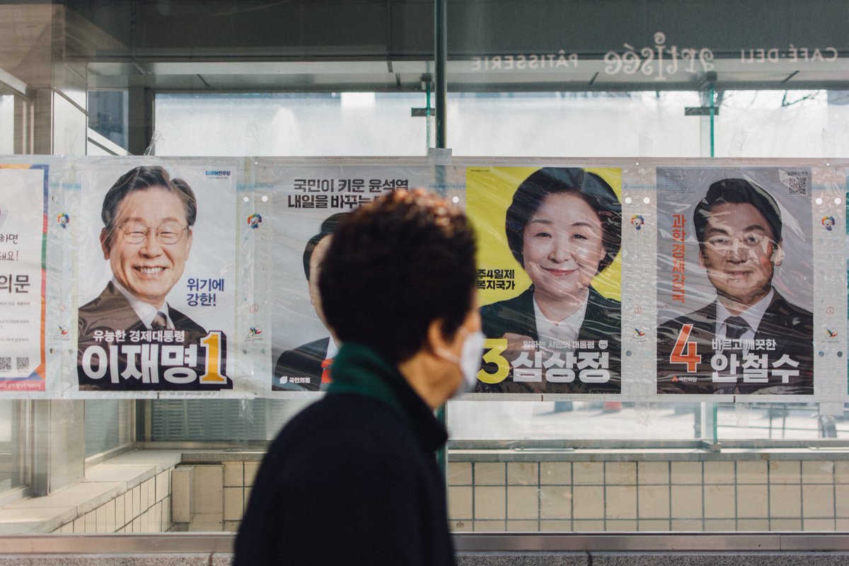 Election Day. A woman walks past election posters for the presidential candidates in Seoul, South Korea #대한민국 #대통령선거 #선거 #서울