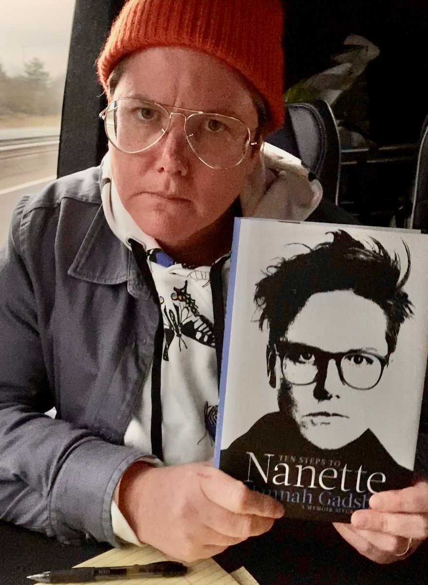 Hannahgadsby's tweet photo. Thrilled to get my hard copy. Thrilled. If you look real closely, you can see I even told my face. 

#TenStepsToNanette is on shelves March 29. https://t.co/JVJcfoaVmI https://t.co/OeYr6UYpiL