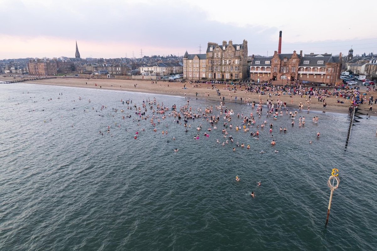 IScreativecomm's tweet photo. Creative Communities Facilitator Danni helped organise yesterday's #IWDSwimrise2022 at Portobello beach, Edinburgh. 700 brave souls dipping in very cold water + raising over £6000 for @EdinRapeCrisis, @EdinWomensAid, @heldinourhearts &amp; @WONDERfdn for Ukrainian Refugees. 💛💙🤍❤️ https://t.co/iEKC9Hwwbb