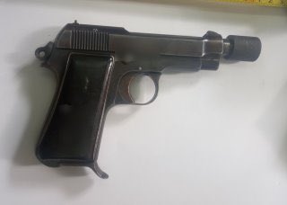 PotempkinBrain's tweet photo. … 2 electric detonators, a Glock 9mm, a Beretta M1934 (thank you @war_noir), an improvised taser, two firearms suppressors, assorted ammo mostly consisting of 9mm cartridges, >3500🌲, >86g❄️, some 🔪s and 📱s and other assorted items. #CopGhanima 2/ https://t.co/c2z9phf7Sg
