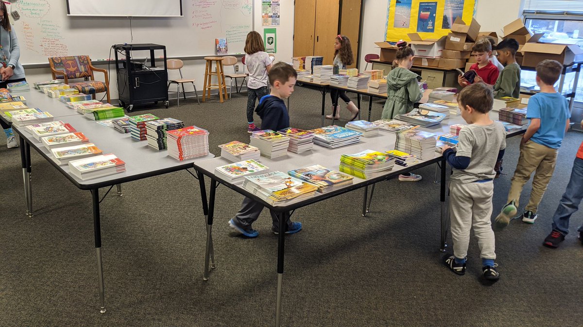 Students making a book selection to add to their personal library. <a href="/MiddleCreekES/">Middle Creek ES</a>