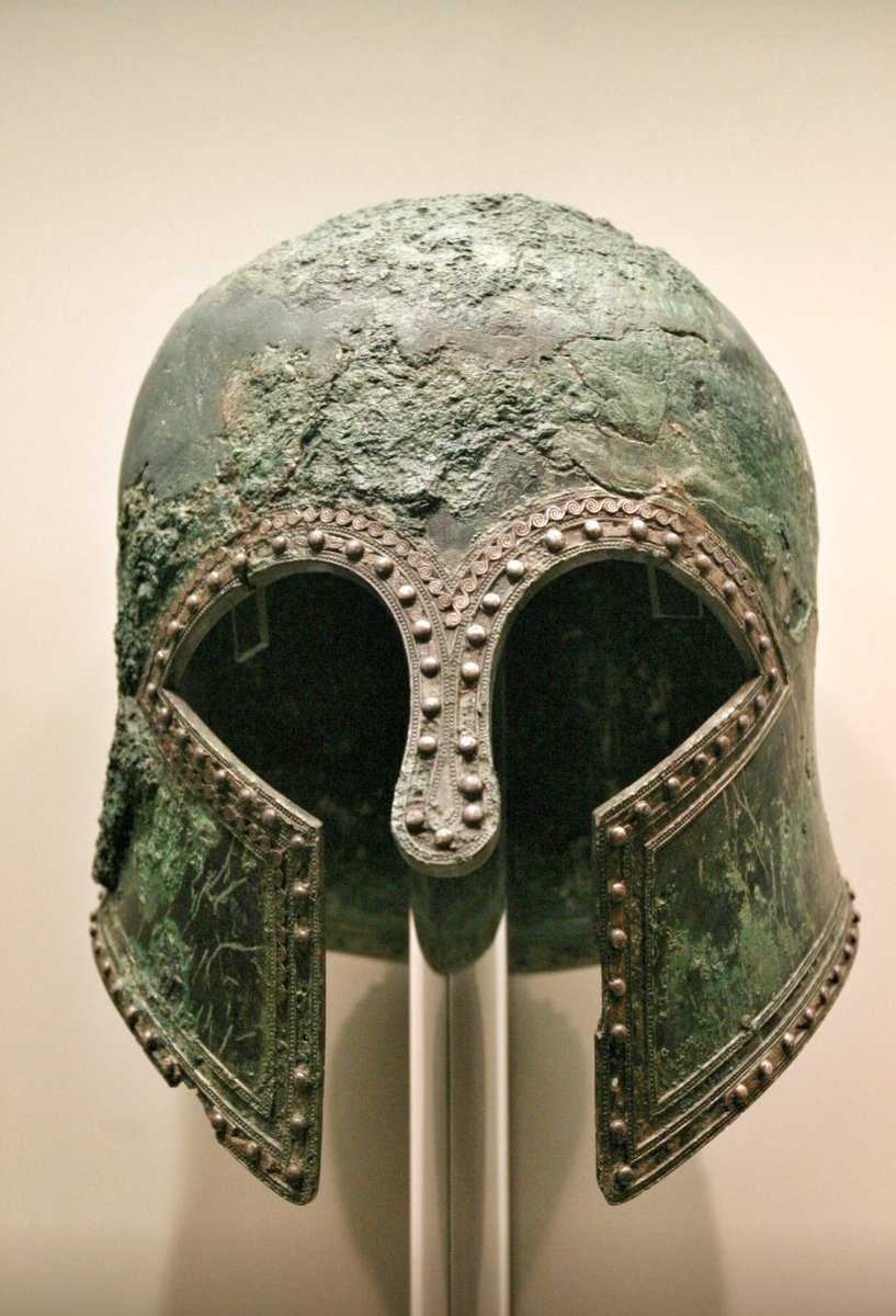 ArysPan's tweet photo. Ancient Greek helmet of Corinthian type. 
~c.600 BCE
📍Archaeological Museum of Olympia, Greece https://t.co/dP8XNkDGTZ