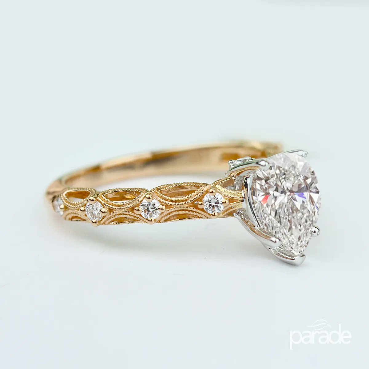 paradedesign's tweet photo. Vintage inspiration flows through an openwork band of shining 18k white gold,  accented with milgrain etched marquise cutouts and a sprinkling of brilliant white diamonds.

#herabridalcollection #engagementring #peardiamond #pearshapedimaond #shesaidyes #paradedesign https://t.co/HfP0b5Seca