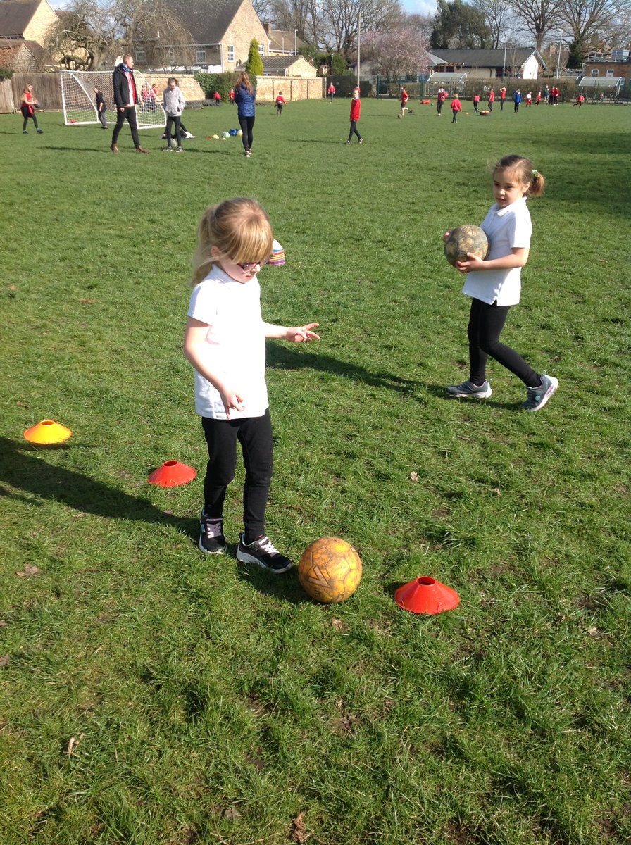 PrimaryHoughton's tweet photo. Girls from Years 1-6 enjoying taking part in the biggest ever football session at lunchtime today  #LetGirlsPlay #GirlsFootballinSchools @HuntsSSP https://t.co/AcQMGOhxZj