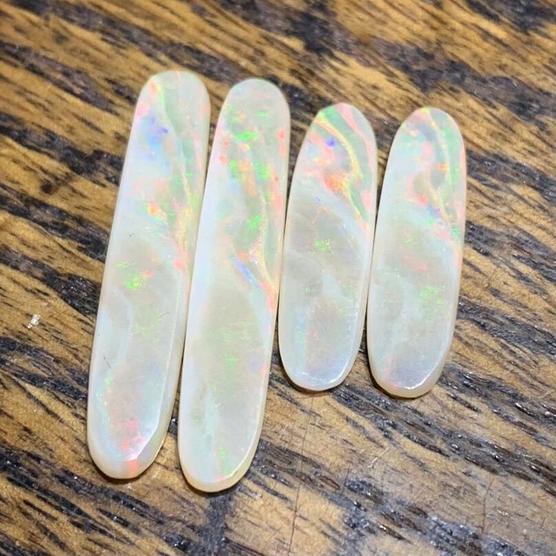 HiTechDiamond's tweet photo. Mike Boland of Hinsdale, NY, is a USMC combat veteran and self-proclaimed “opalholic” 😍 He’s been cutting opals for 5 years and making jewelry for 2 years 😃

He prepped these opals for 2 pairs of earrings with his #hitechdiamond trim saw and @cabking cabbing machine.

#lapidary https://t.co/begND4A5iK