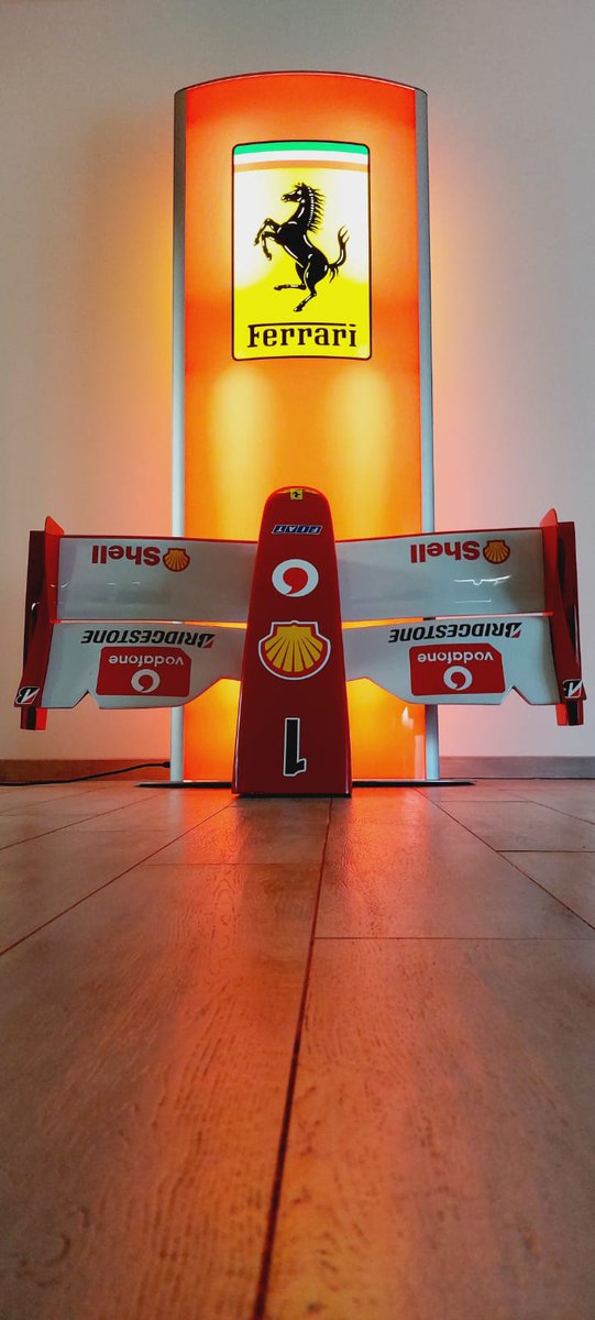 2002 Michael Schumacher Ferrari F2002 nosecone replica. This fantastic replica display piece bears all of the appropriate sponsor logos and is the correct size and shape of the pricey original. The World Championship nose measures 57 "x  32" x 18″.

Price upon request