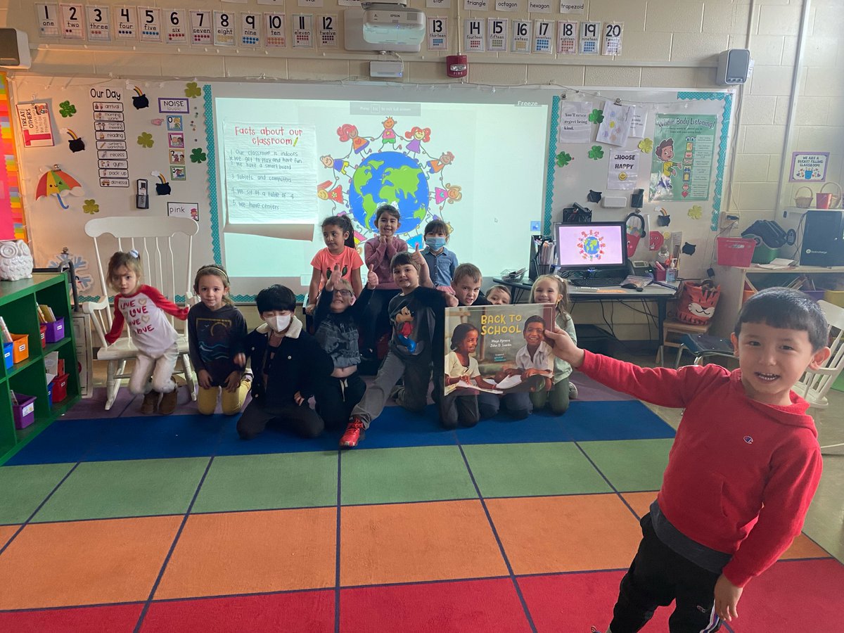 LECCTigerCubs's tweet photo. In @MissMarcheschi's KG class, #LECCTigerCubs are discussing facts about schools around the world to prepare for non-fiction writing entries.  #LECCTigerCubs even learned from their peers how to say "Hi!" in other languages! So much fun learning from each other!✌️🏻🧡🐯 https://t.co/pR6SCrKNuy