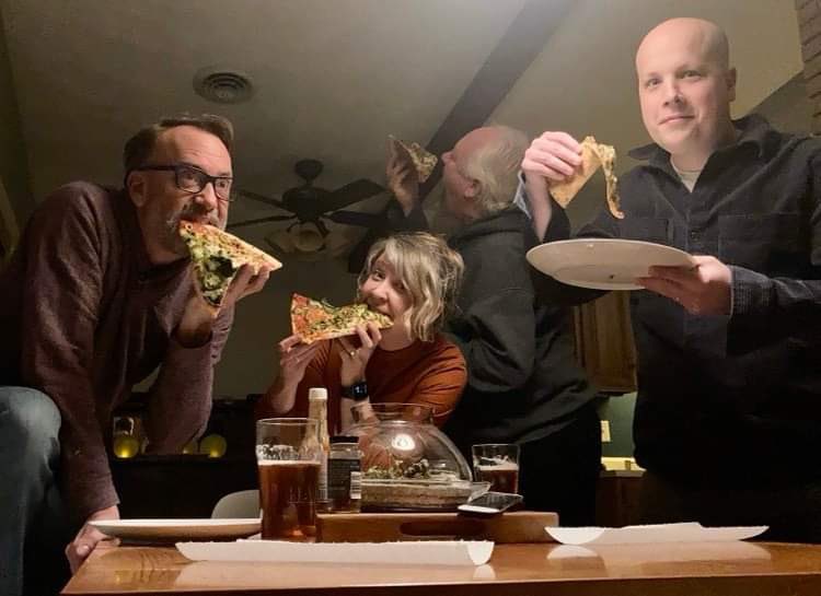 Subatlantic partaking in the delicious “Centaur Verde” pizza creation from <a href="/centaurnoir/">Centaur Noir</a> for Loepiez Pizza before we practice this evening. Go get some, folks! Profits go to a good cause helping out with a friend’s medical bills!