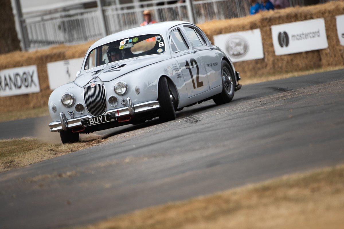 fosgoodwood's tweet photo. Sideways in a classic Jaguar is the epitome of style! #FOS https://t.co/3GkiOFnKHr