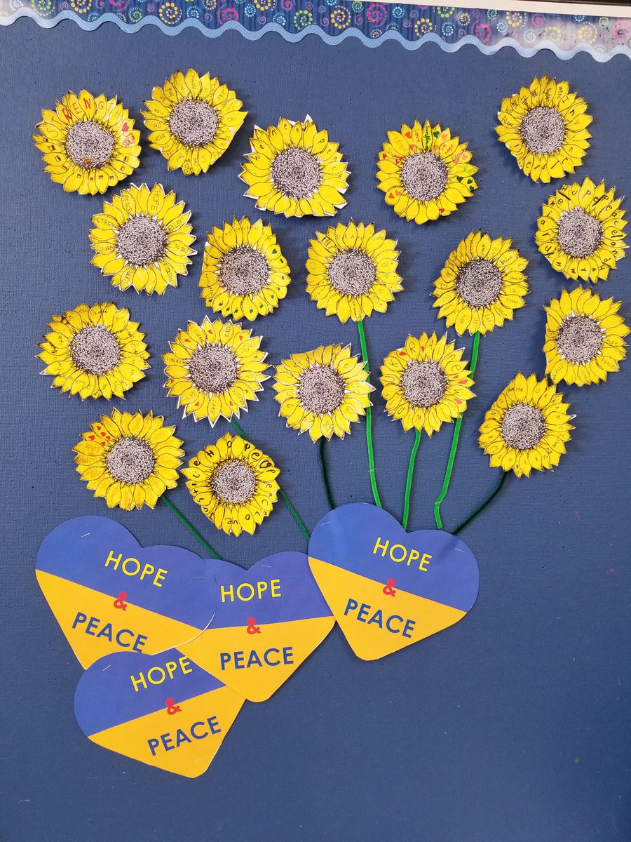 Today, we wore blue and yellow to show support for Ukraine. Our students filled our school with sunflower art, the national flower of Ukraine. #YouthStandWithUkraine <a href="/PembinaTrails/">Pembina Trails SD</a>