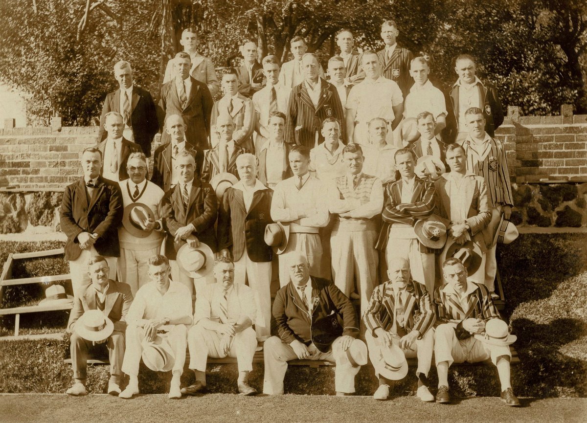 Can you identify the people or the place in this photograph? Looks to be a group of bowlers from various clubs seeing the first row are in the ditch and patches, plus it was found in a family collection of photos with strong link to lawn bowls. #mysteryphoto #lawnbowls #heritage