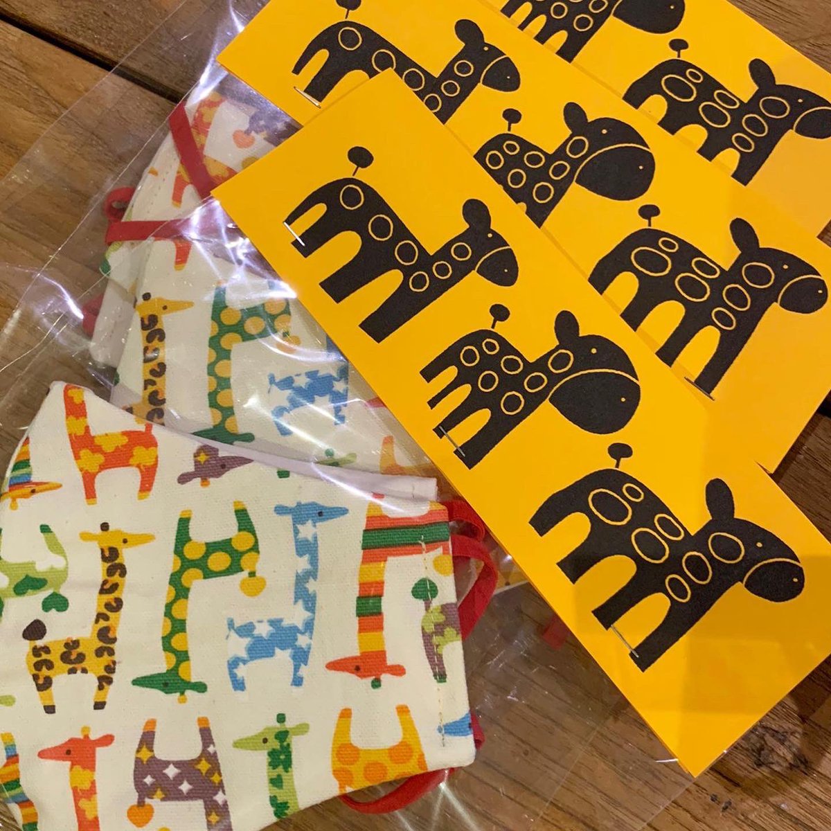 Cute giraffe masks for Aisha’s friends at school. She also illustrated the cute black and yellow giraffes. #autism #artistwithautism