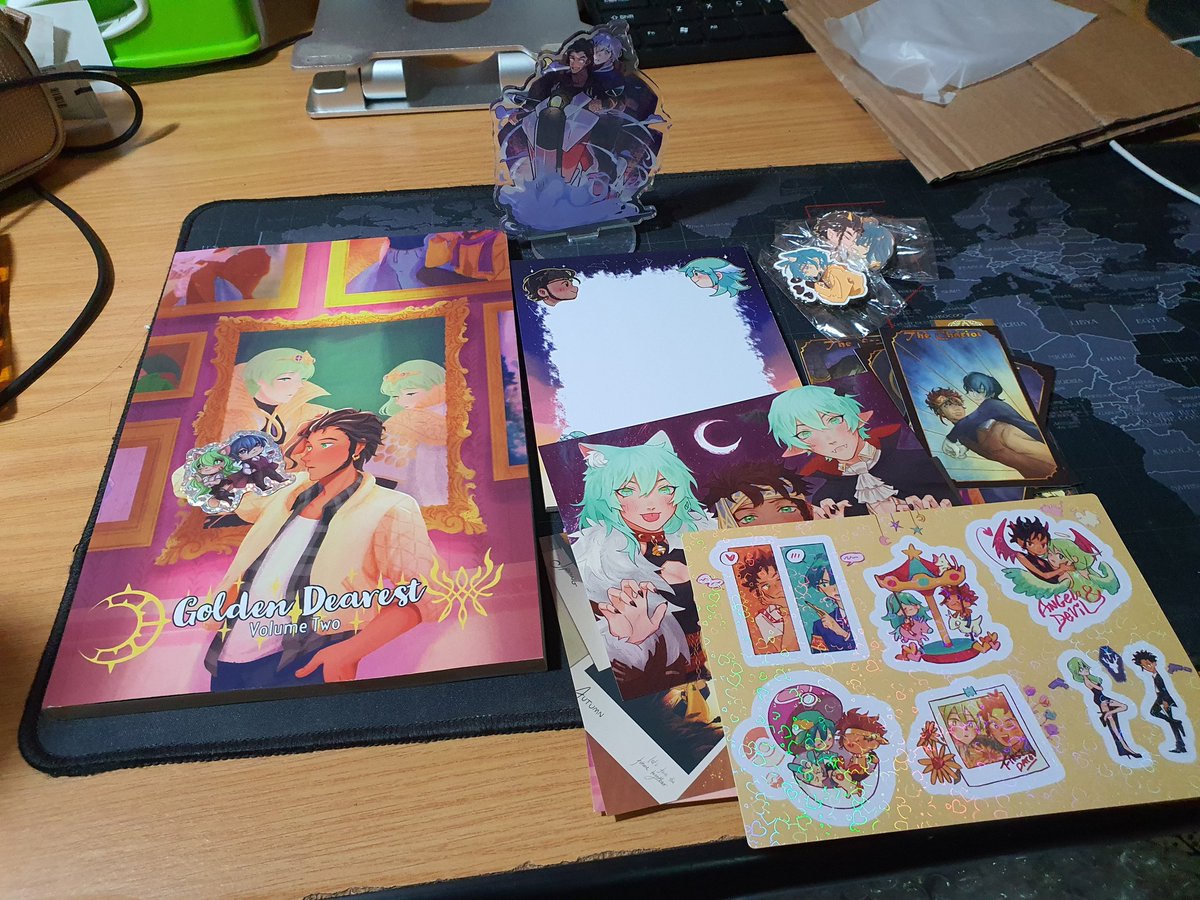 aimoahmed's tweet photo. Got my Golden Dearest Vol 2 contributor's copy and goodies in the mail today ☺️☺️☺️ Everything looks so shiny and cute 🥺🥺🥺 Thank you @ClaudelethZ 🤟😭🤘 https://t.co/1txbXPDRpl