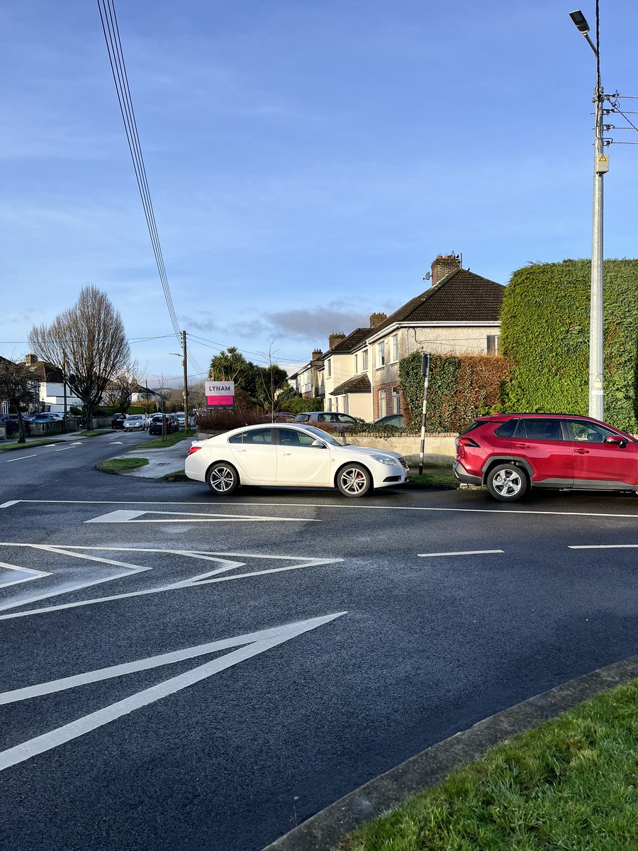 SteveGLdn's tweet photo. So I have reported this to @GardaTraffic in Dundrum 5 times and to @dlrcc but nothing, both of these cars that don’t live in the road/area parked against a solid line every week day that forces cars turning in into oncoming traffic ! Cannot be that hard to give them one ticket ! https://t.co/U1vWlJCcJG