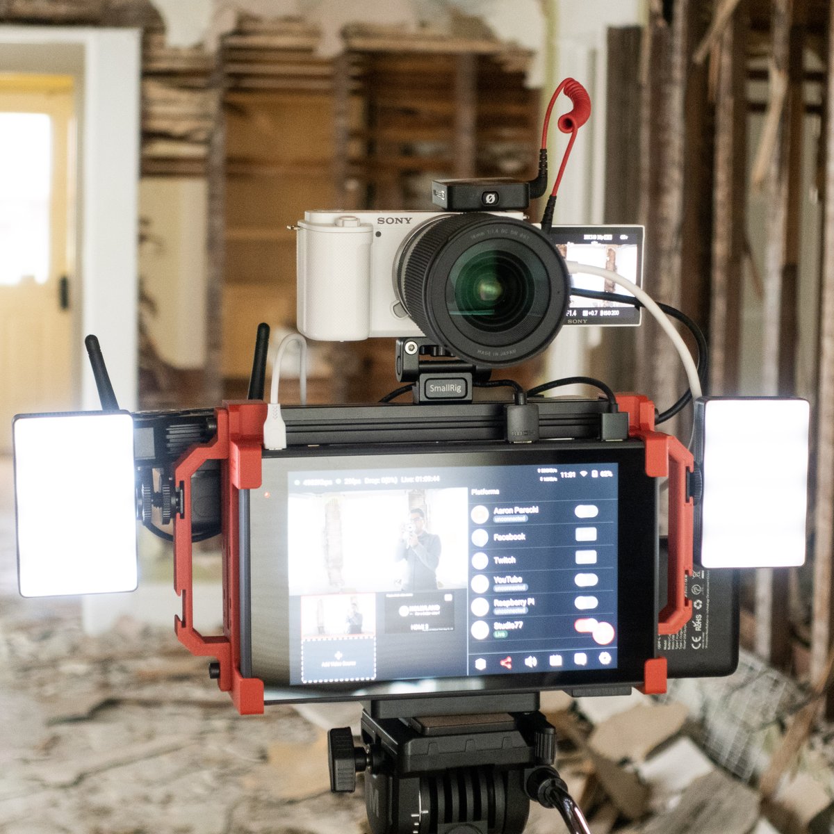 YoloLivTech's tweet photo. The YoloBox Pro with PK1 Cage makes a great portable rig for livestreaming on location! If you missed Aaron's livestream yesterday, He streamed from his house he is  tearing apart!

Get yours from @aaronpk_tv and @inux3d
link: https://t.co/m9qQ0gQ6zA

#pk1stand #streamingrig https://t.co/PW8cNHgaHx