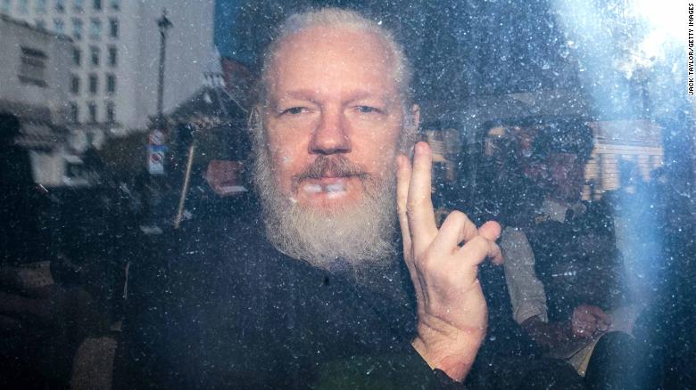 kachoraz's tweet photo. while #BorisJohnson tries and fails to look like a human being #JulianAssange is still being held in prison and #persecuted for exposing the #WarCrimes of the #EmpireOfLies https://t.co/DBa9GsEHVT