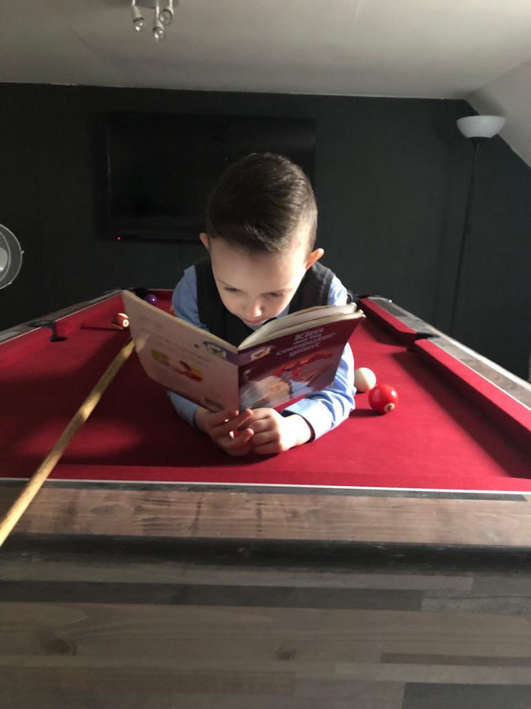 carlychambersx's tweet photo. @StBrigidsPS  Leo reading his reading book in his unusual place ☺️ https://t.co/GkgdmJG8pf