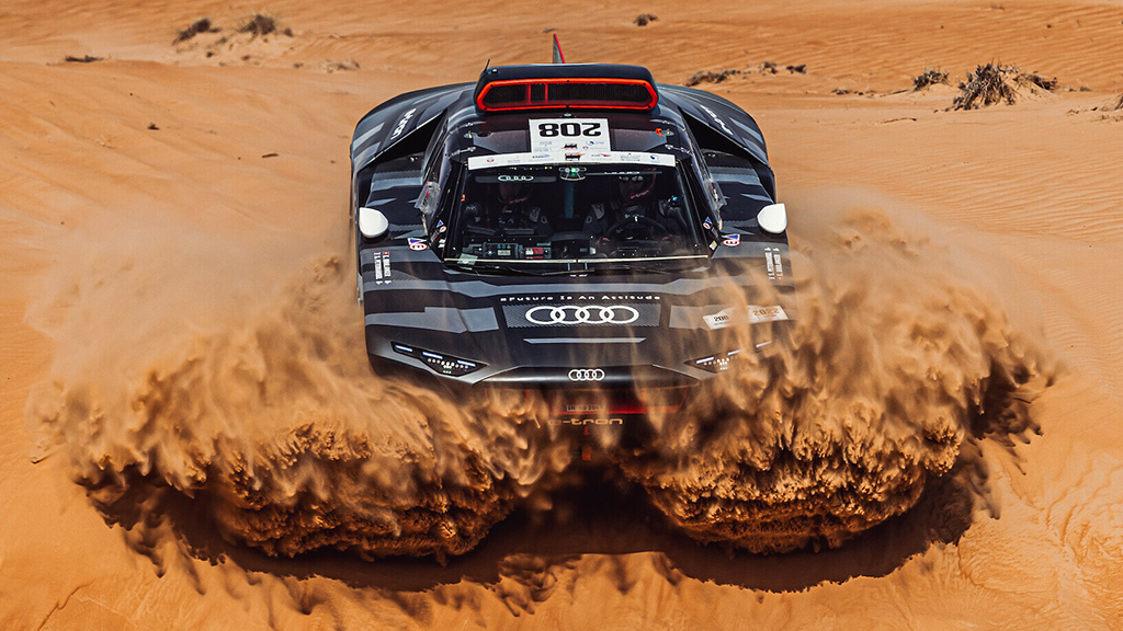 audisport's tweet photo. MEDIAINFO: Emotional first victory in the desert: Audi RS Q e-tron wins in Abu Dhabi

>> https://t.co/Z68U85pCQU

#FutureIsAnAttitude #RoadToDakar2023 #ADDC2022 #RSQetron https://t.co/wprXZyKhOt