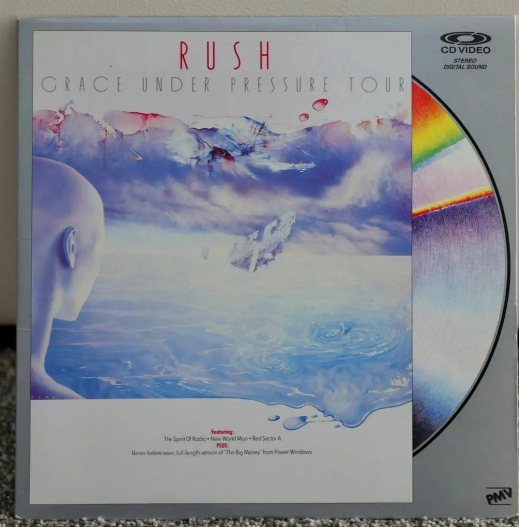 RushFanCast's tweet photo. This week on the @RushFanCast, we read an email from Adam from Detroit, AKA "The Rush Man", who shared images of his @rushtheband laser disc collection with us! These are very cool. Anyone else in the #RushFamily have any laser discs to share? #LaserDisc #RushLive #TheRushMan https://t.co/ztR0cmT2D5
