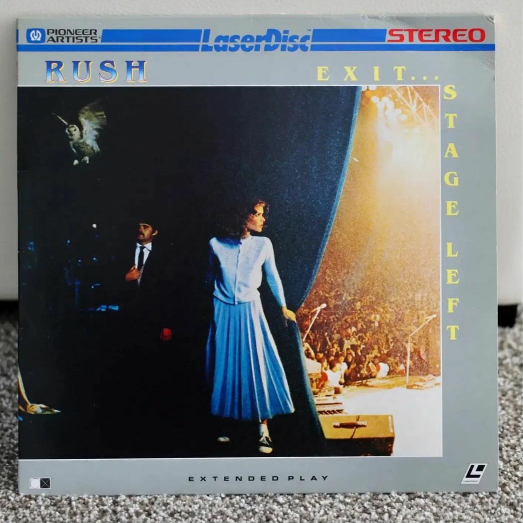RushFanCast's tweet photo. This week on the @RushFanCast, we read an email from Adam from Detroit, AKA "The Rush Man", who shared images of his @rushtheband laser disc collection with us! These are very cool. Anyone else in the #RushFamily have any laser discs to share? #LaserDisc #RushLive #TheRushMan https://t.co/ztR0cmT2D5