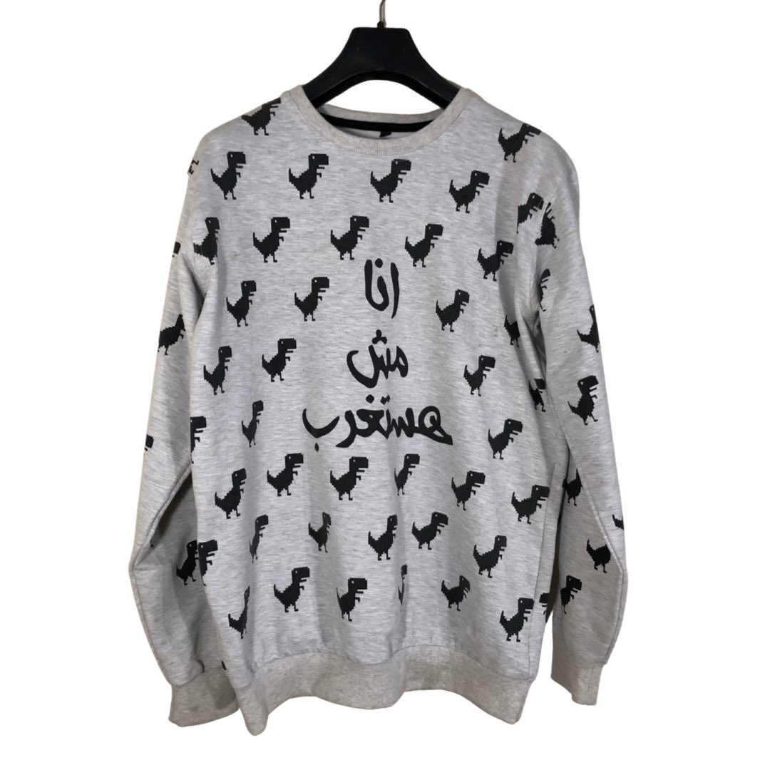 thriftlotus's tweet photo. ""انا مش هستغرب"" sweatshirt 🦖
Size: xl (68cm*52cm)
Brand: Qaf Gallery https://t.co/0OfQvnFnvh