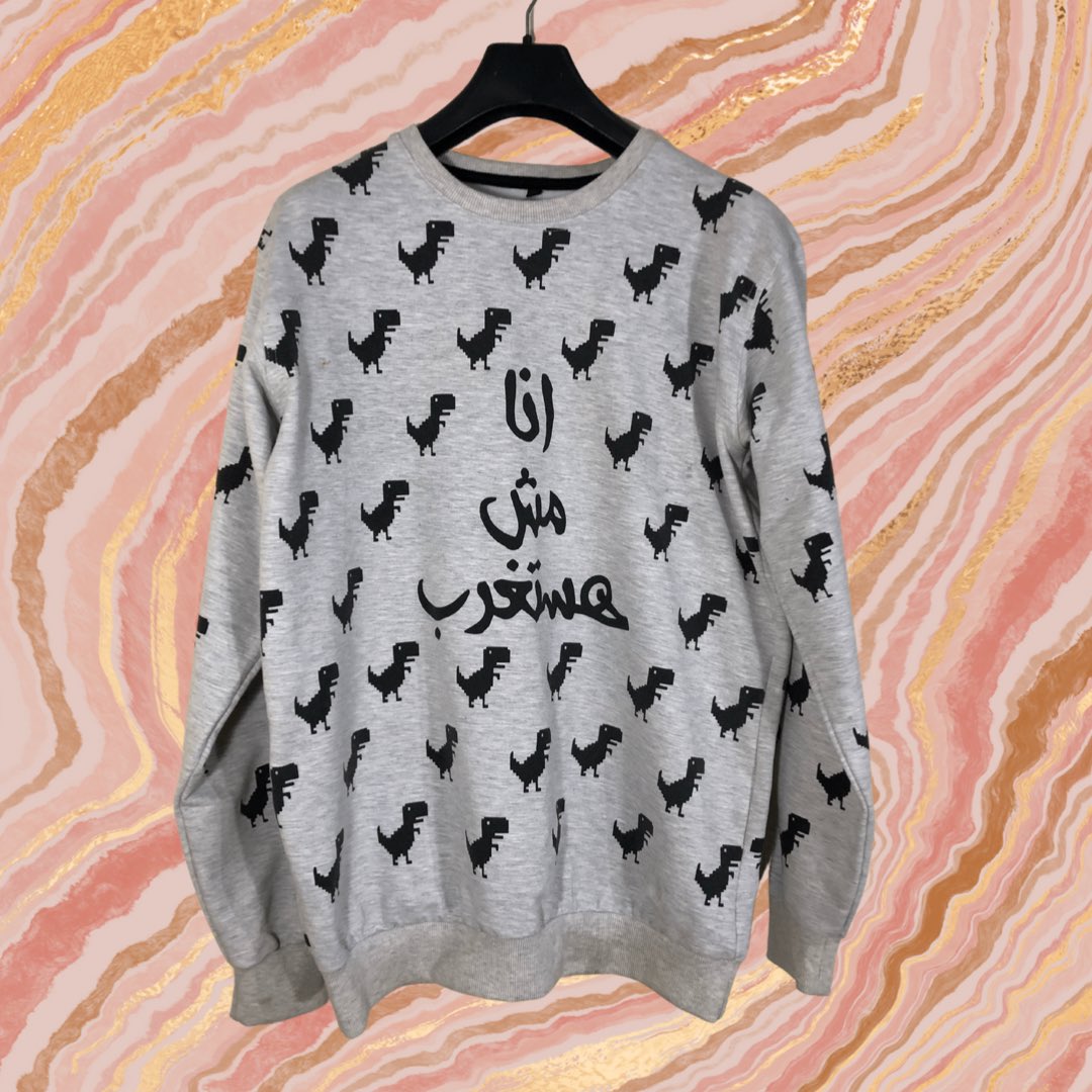 thriftlotus's tweet photo. ""انا مش هستغرب"" sweatshirt 🦖
Size: xl (68cm*52cm)
Brand: Qaf Gallery https://t.co/0OfQvnFnvh