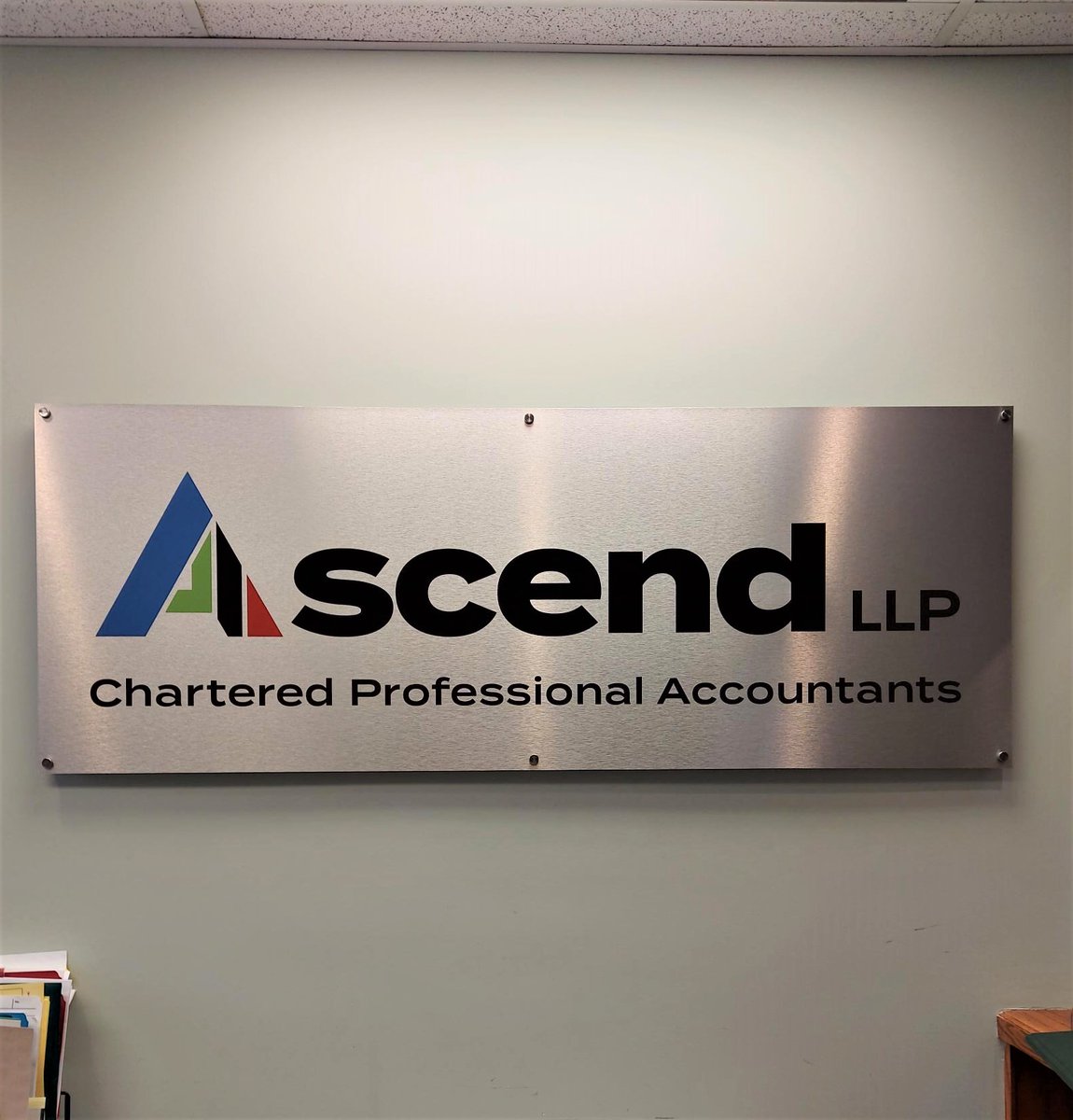 Flewwelling's tweet photo. We just completed some new office signage for our friends at Ascend in their #UptownSaintJohn location. These silver aluminum composite signs have contour cut vinyl graphics allowing the silver effect to show throughout the sign. https://t.co/n2dl6Qnxvp