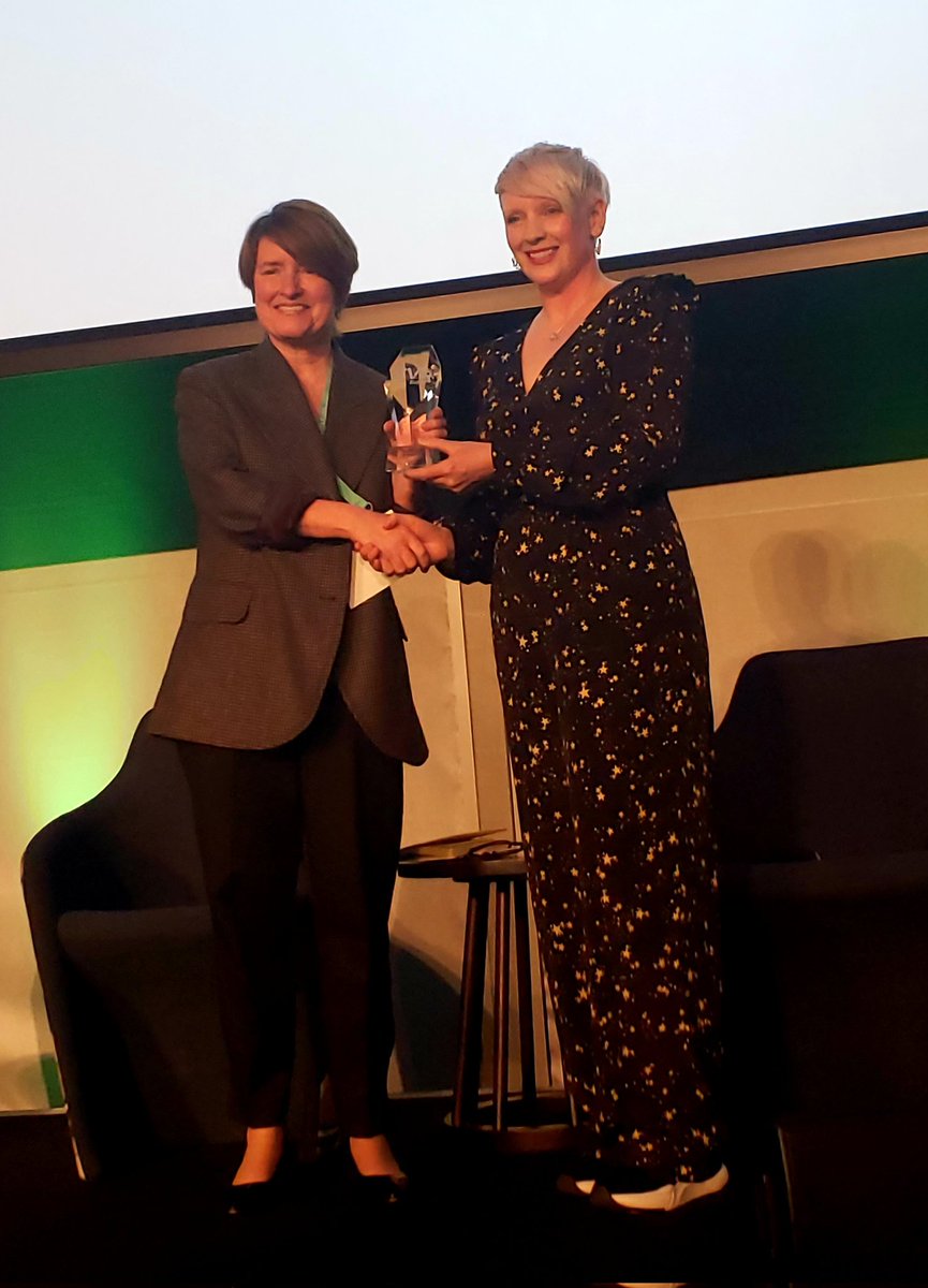 carriebowden's tweet photo. @heathermclean presents the @SVGEurope Women's Outstanding Achievement Award to @FA Director @KellySimmo1 @BarclaysFAWSL during the #FootballSummit @SpursStadium Congratulations! https://t.co/95BwXGHt3k