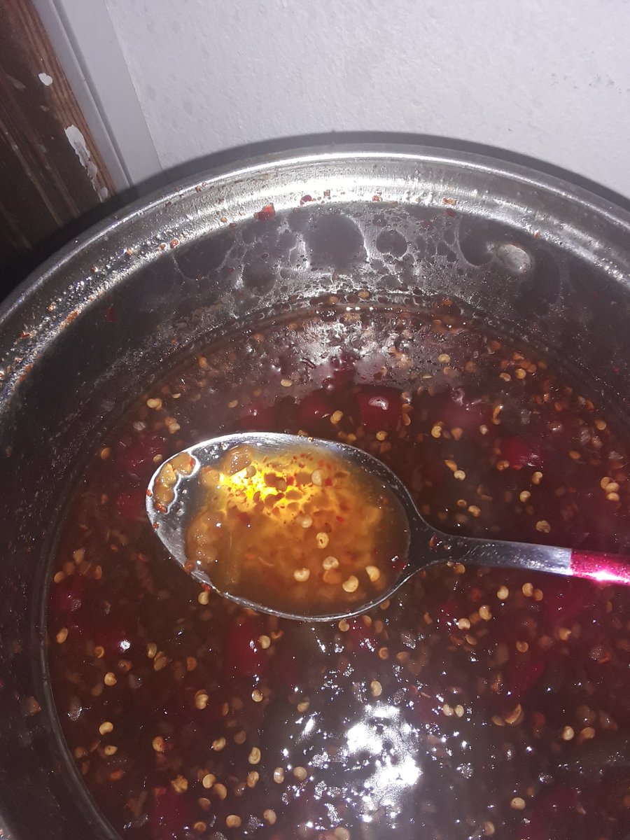 SirJasperRules's tweet photo. My experiment in chilli sauce, two batches, strained and chunky. It is not bad tbh. Fairly hot, but afterglow rather than afterburn. Slowly, I learn. https://t.co/ZgDFNX2euk