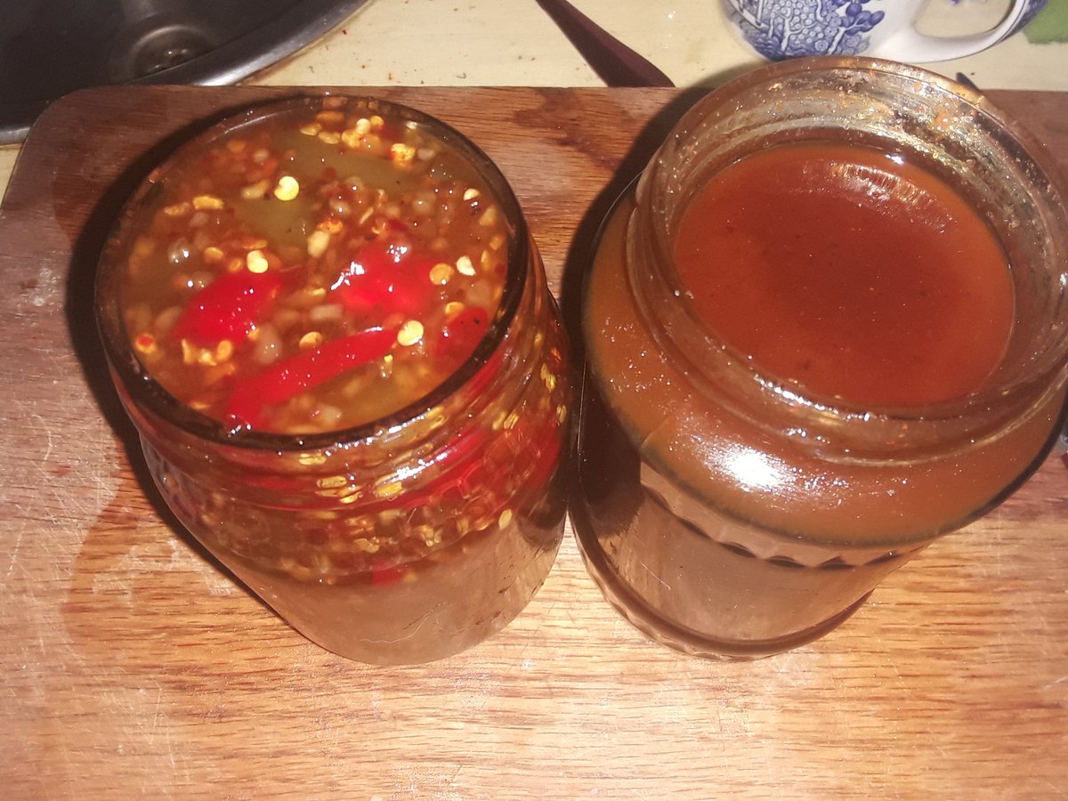 My experiment in chilli sauce, two batches, strained and chunky. It is not bad tbh. Fairly hot, but afterglow rather than afterburn. Slowly, I learn.