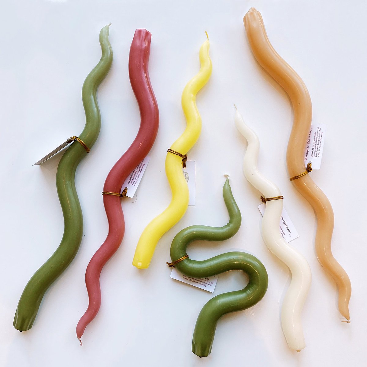 TokenToronto's tweet photo. adorable squiggle candles by Viisiionss 〰🐍🕯 https://t.co/okfZ6Bh44Z