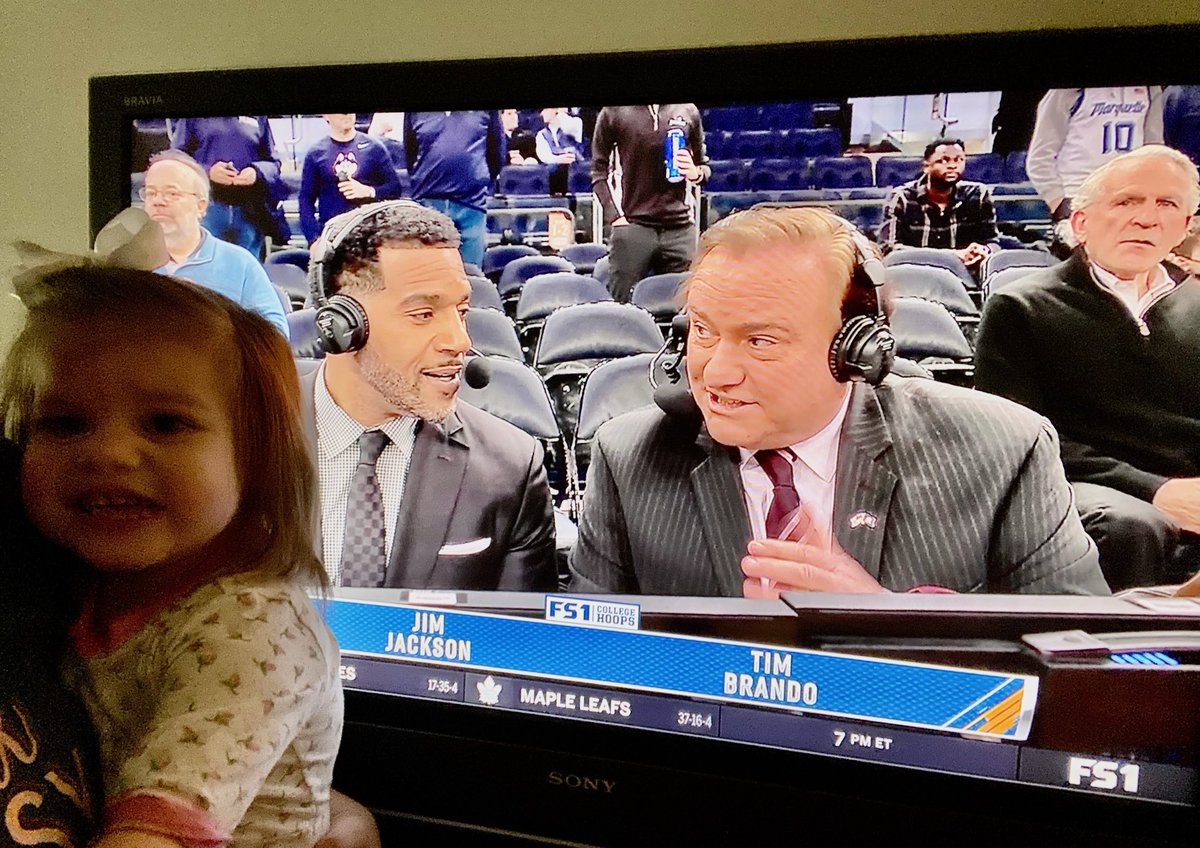 TimBrando's tweet photo. We’re enjoying the Madness in Gotham and ⁦@TiffanyBrando⁩ Captain of #TeamBrando has Baby Amelia watching her Big Daddy B 👍in March that’s how we roll. ♥️♥️💜💜🏀🎙📺 https://t.co/S4TXHWCTpa