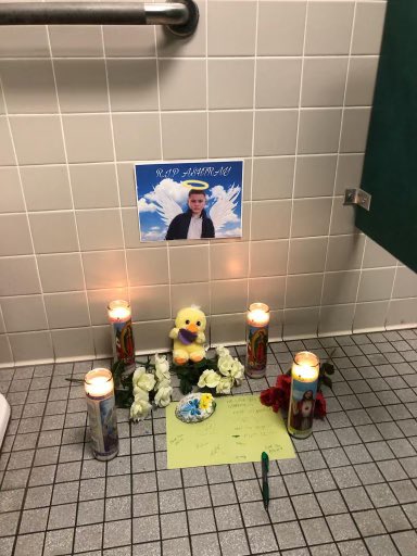 Now why does my school have a shrine for Ashtray in one of the girls bathrooms
