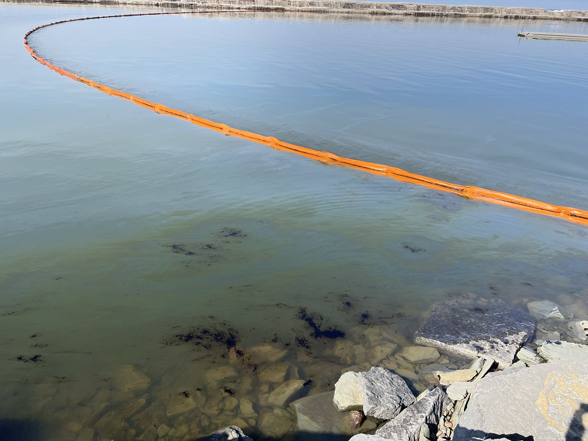 (1/2) Environmental authorities and U.S. Coast Guard officials responded to an oil spill at the Lake Ontario shoreline by Oswego Harbor. The oil fuel leak, Coast Guard officials tell me, was found in the property of the Harbor Generating Station