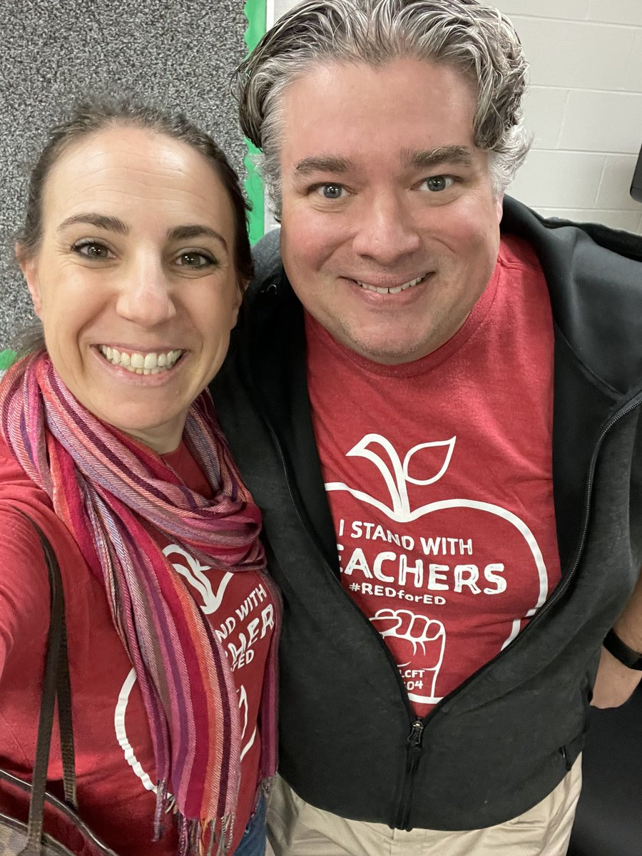 Social Studies Sarah and your neighbor and mine, Mr. Rogers, sporting the red for ed!
