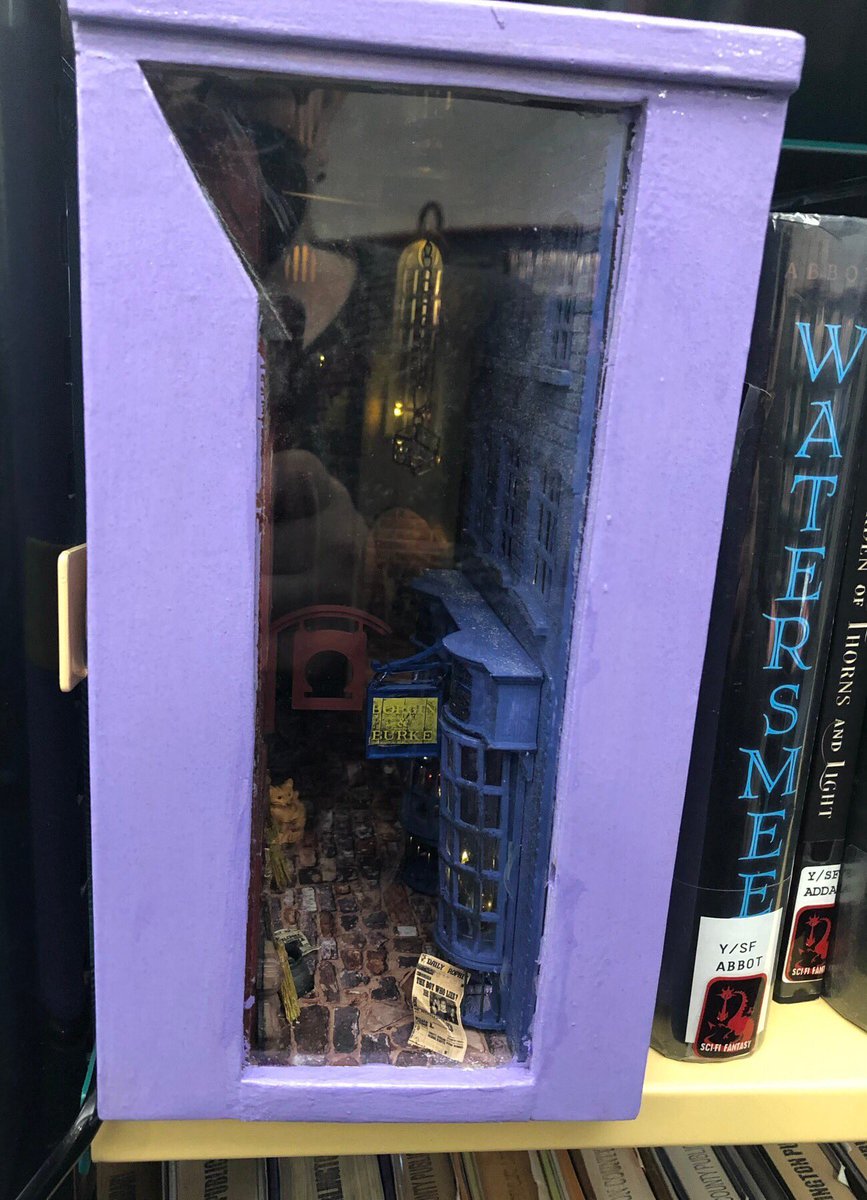 APL_TheShop's tweet photo. Have you spotted these Harry Potter Book Nooks in Central Library's Youth Services area? Book nooks are small dioramas that give the illusion that there is another world hidden behind the shelves. These feature parts 3D printed in The Shop! #MakersGonnaMake #BookNook #HarryPotter https://t.co/2rV2EsfZqT