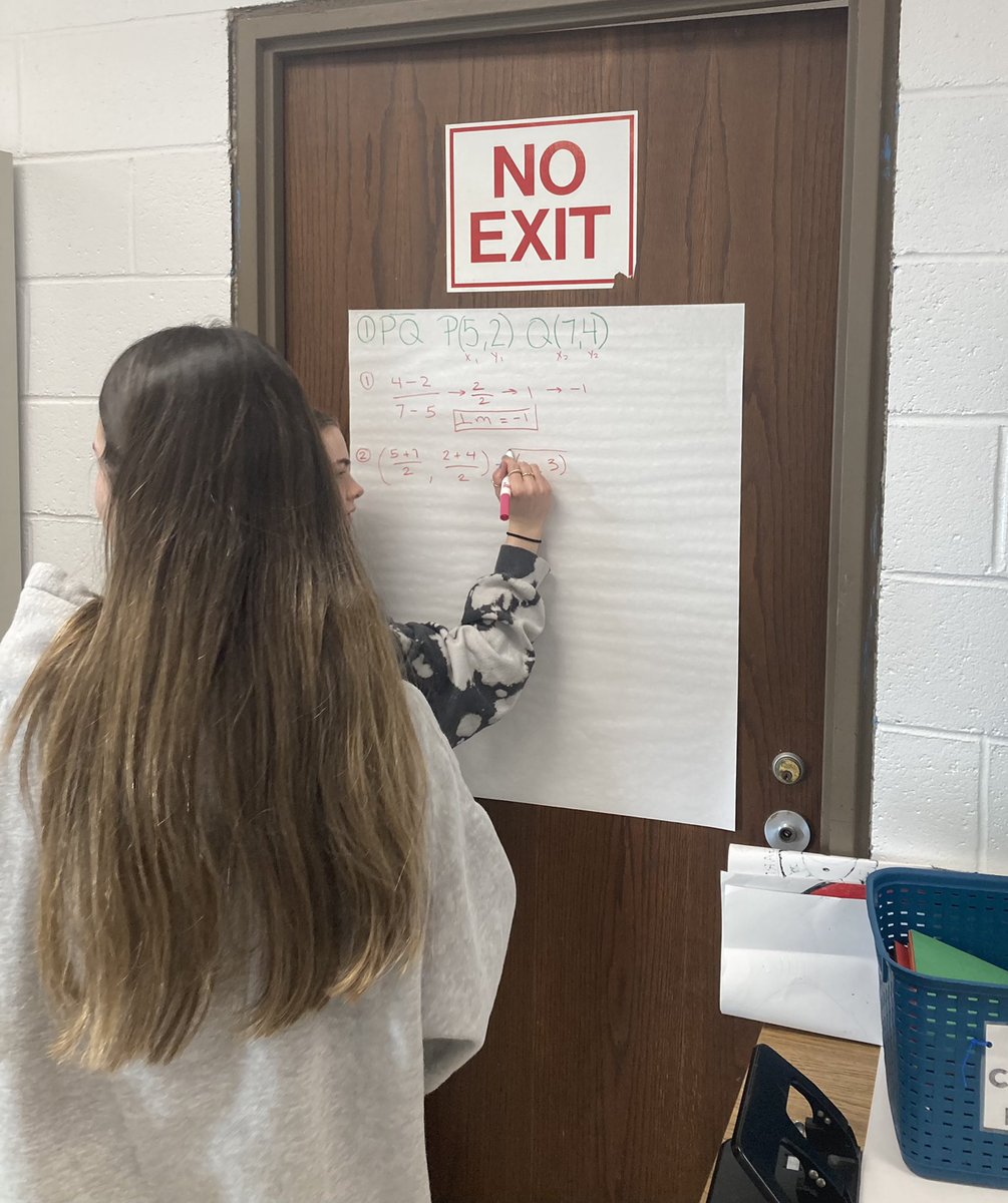 Students collaborating to generate the equation of a perpendicular bisector. #iteachmath #ibmath