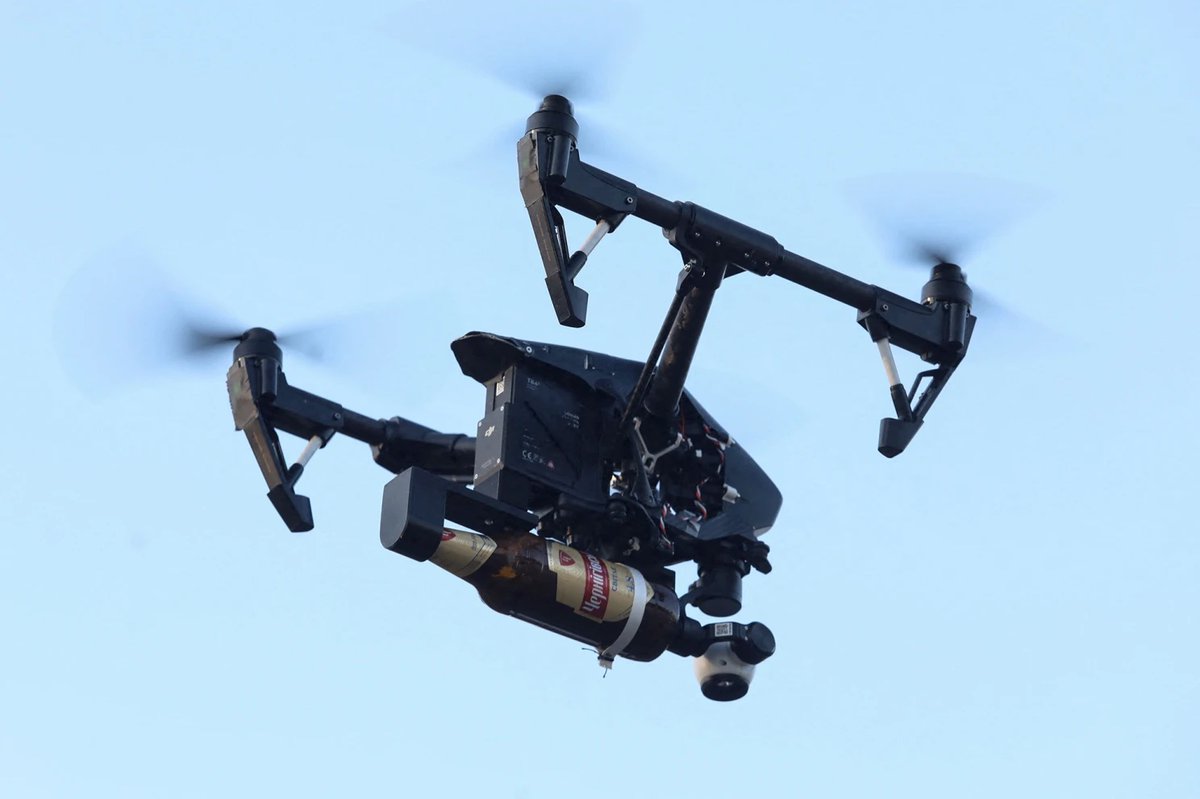 DroneXL1's tweet photo. Defending against the invading Russian aggressors, the Ukrainian military has developed a Molotov drone. Or more specifically, a DJI Inspire 2 to drop the flammable cocktails. #drone #drones #molotovdrone #djidrones @djiglobal  https://t.co/wTOdlEQgI1 https://t.co/swLmRl1WOg