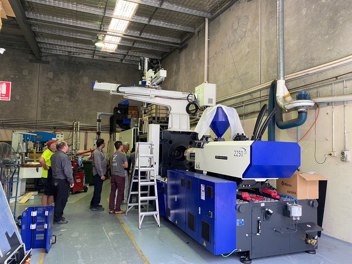 RedflowLimited's tweet photo. The team at @Redflow are very excited about the new injection molding machine that arrived today.
​
​This new machine will now allow us to undertake rapid prototyping and small scale production.
​
​#redflow #zincbromine #flowbattery #energystoragesolution https://t.co/P6G02Urg9h
