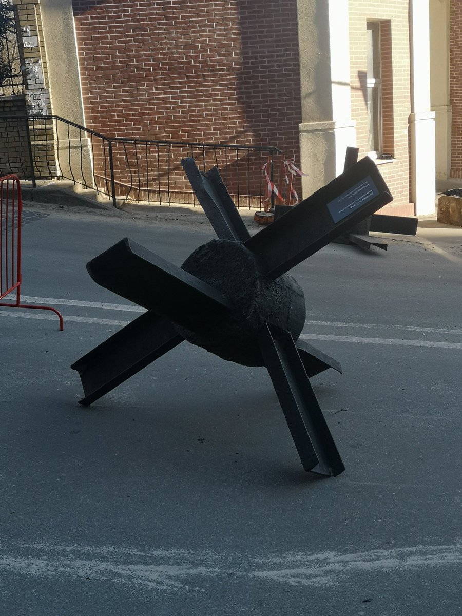 dennislindbom's tweet photo. Found a tank trap at a roadblock in Kyiv today with a plaque indicating that it's was used during WW2. #ukraine #kyiv https://t.co/BsI6drLScU