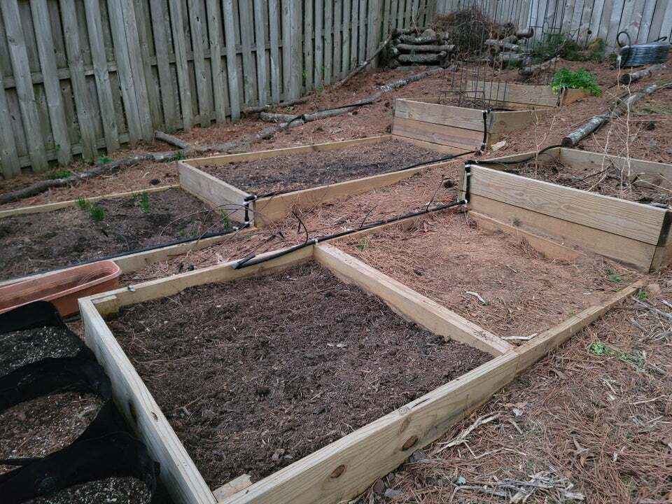 When you've got a hillside for a yard but still want to garden, terraced garden beds