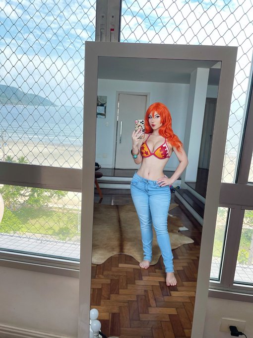 Nami from One Piece 🍊❤️💰  Do you guys want me to post more pics of this cosplay? https://t.co/aHoLBN